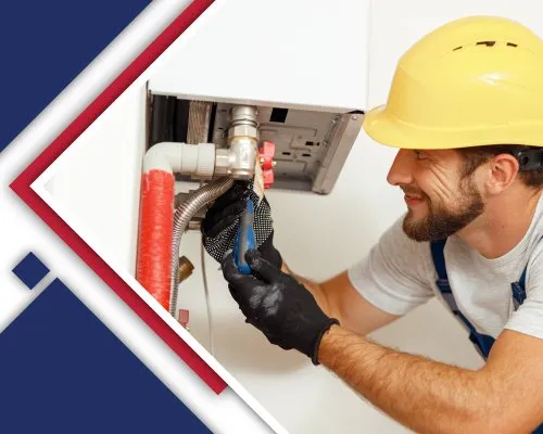 A plumber working on pipes connected to a white boiler